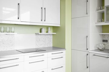 Fototapeta premium Simple kitchen in white colors