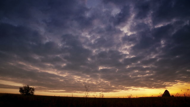 Beautiful racing clouds and sunrise.