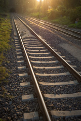Obraz na płótnie Canvas railroad tracks leading in tunnel