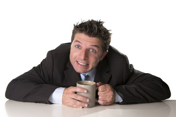 addict businessman holding cup of coffee in caffeine addiction
