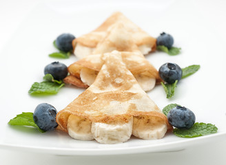 Pancake with blueberry isolated on white