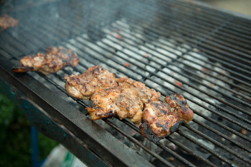 Grilled beef steaks and flaming grill