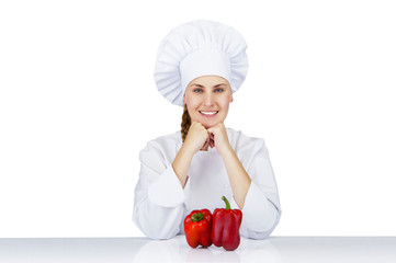 Chef woman. Isolated over white background by the table with pap