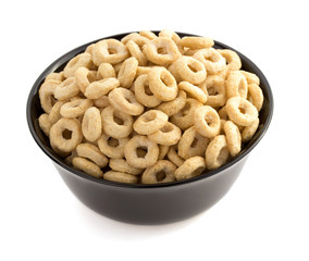 corn flakes rings in bowl  on white