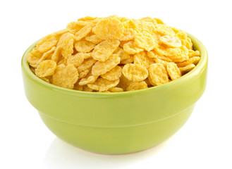 corn flakes in bowl  on white