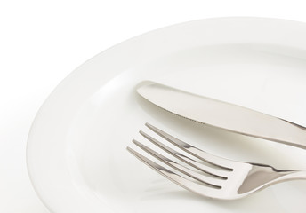knife and fork on white
