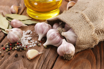 garlic in a sack, sea salt, pepper, bay leaf, sunflower oil