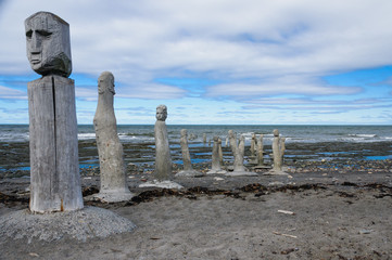 stonework statues leading into the St. Laurence River