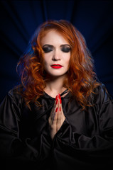 Witch on blue rays background