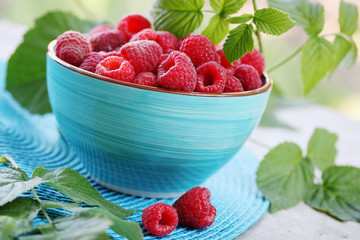 juicy raspberries in a bowl