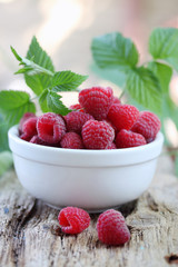 raspberries on a wooden board