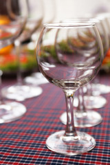 Buffet table with dishware waiting for guests