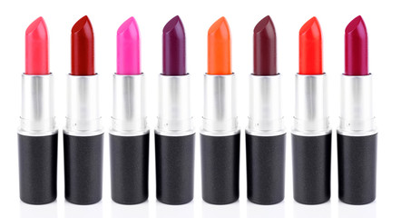 Set of lipsticks isolated on white