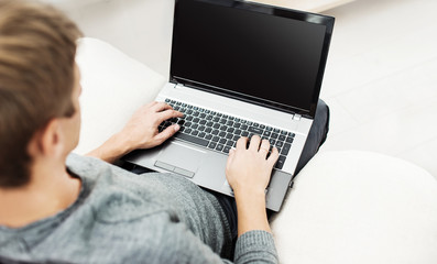 Man working on the laptop at home