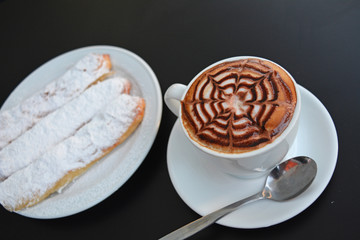 Cup Of  Hot  Cappuccino And Sweet Dessert