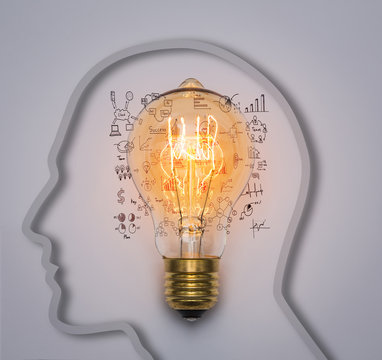 Light bulb with drawing graph inside a head