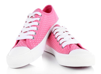 Pink trainers isolated on white
