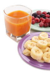 Slices of bananas with berries