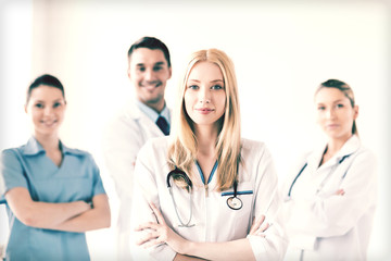 female doctor in front of medical group