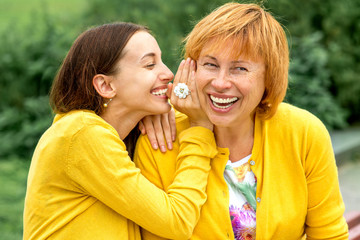 Portrait of mother with her daughter in the park