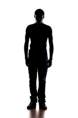 silhouette of a half-naked African man on a white background