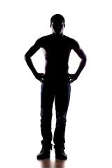 silhouette of a half-naked African man on a white background