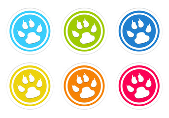 Set of rounded colorful icons with pet footprints symbol