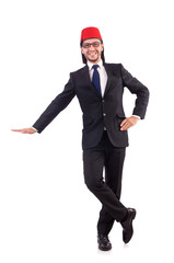 Businessman wearing fez hat isolated on white