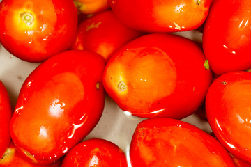 Fresh tomatoes in water