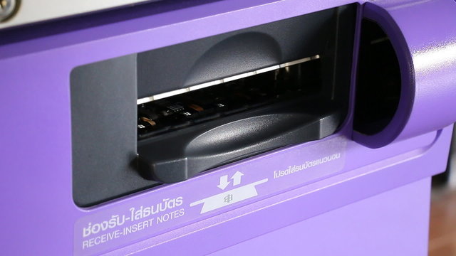 Woman Use Automatic Payment Machine And Receive Change Money