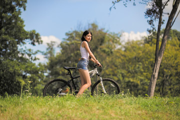 Fototapeta premium girl with bike