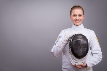 Young woman engaging in fencing