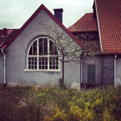 European style house with tile roof