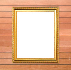 blank golden frame on wood wall