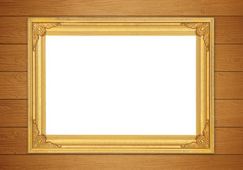 blank golden frame on wood wall