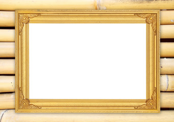 blank golden frame on colorful bamboo wall