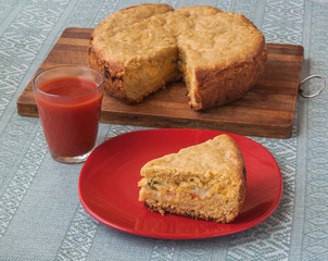Vegetable pie of oat flour and cheese on a cutting board