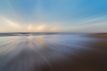 Fototapeta na wymiar Sunset in partial motion blur