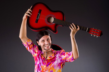 Man wearing sombrero with guitar