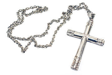 Silver christian cross necklace isolated on white