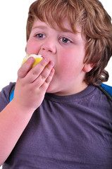 closeup portrait of kid eating an apple