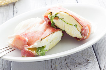 Tomino cheese with bacon