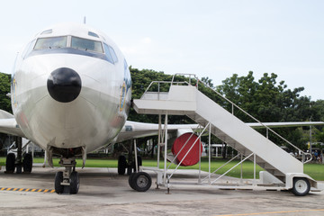 Fototapeta premium Airplane nose with passenger stairs