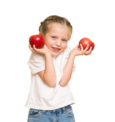 little girl with fruits and vegetables on white