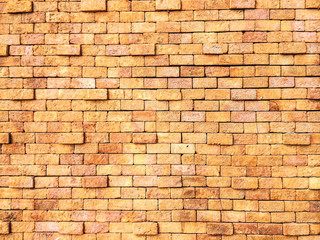 Fototapeta na wymiar yellow Background of brick wall texture