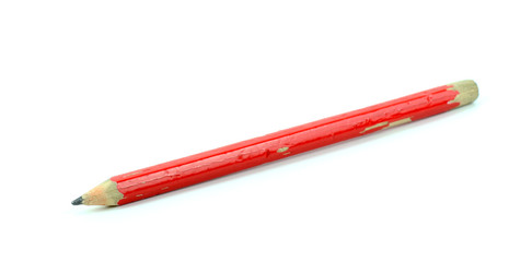 Old pencil on a white background.