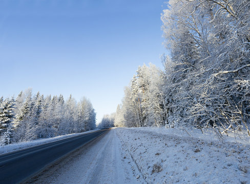 Russian winter forest road in snow