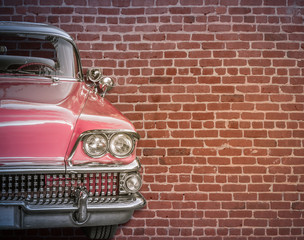 Classic Car Against Red Brick Wall