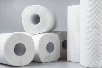 Stack of white tissue paper rolls.