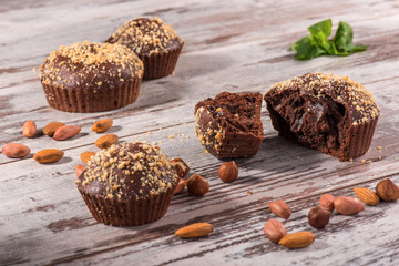 Close-up picture of chocolate cupcake with almonds and hazelnut